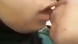 Arab sex, he sucks on her boobs in the street