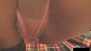 Japanese girls in uniform squatting