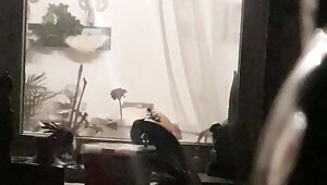 Window voyeur after shower