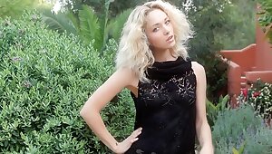 Sweet blonde teen posing