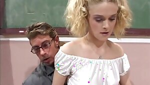 Scoolgirl's sex lesson in the classroom