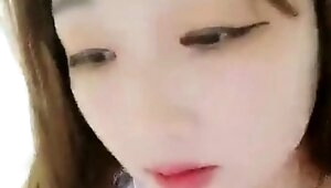 Extreme close up of Japanese teen masturbating