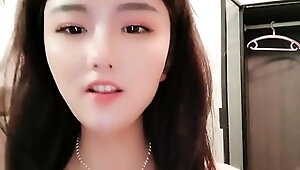 Asian teen masturbate with big toy