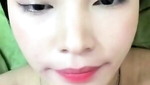 Amateur Asian teen sucks this big hard cock