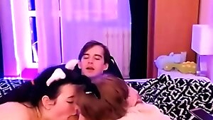 Two horny teen babes take turns sucking and riding hard dick